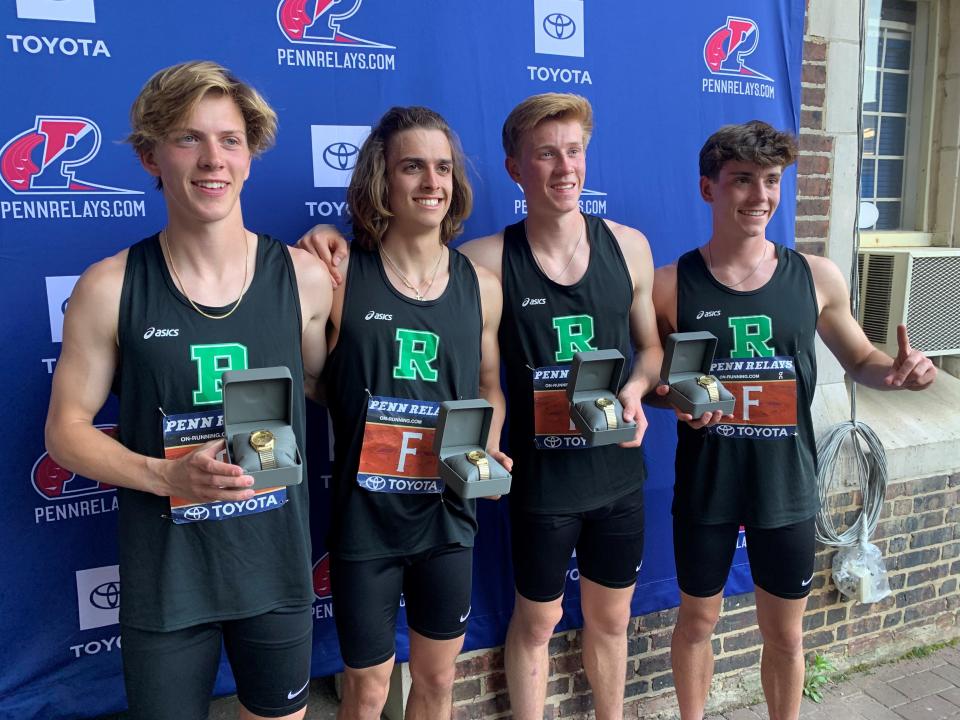 Ridge's 4x800 holding their watches: Andrew McCabe, James Kisker, Patrick Doran, Jackson Barna