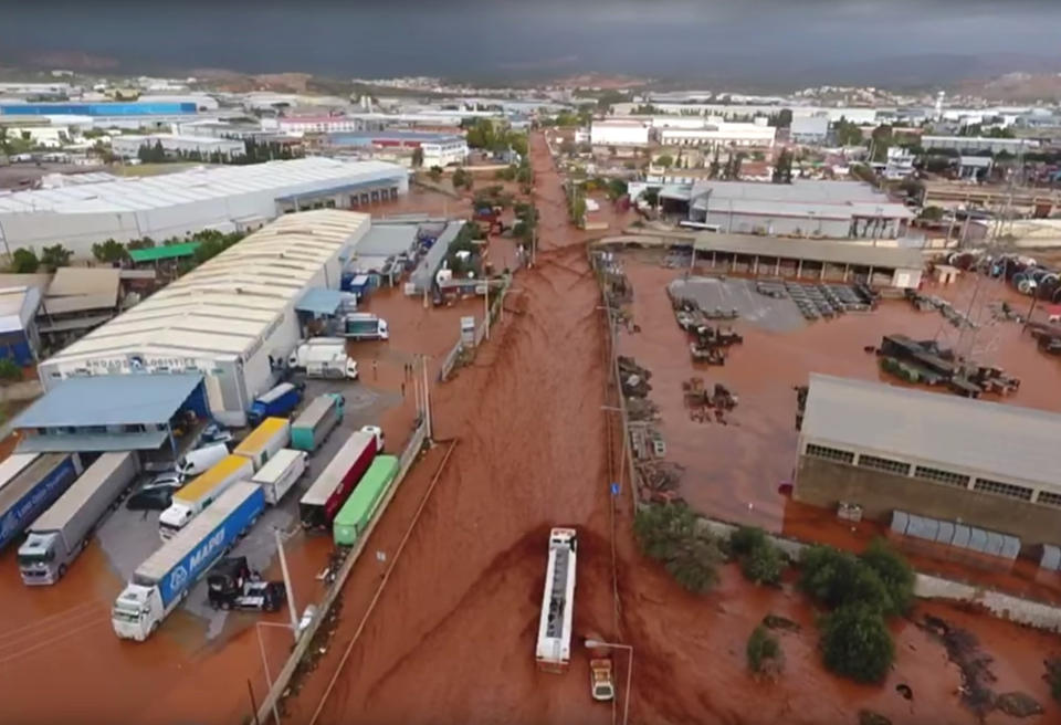 <p>General aerial view of a flooded area following flash floods in Mandra, West Attica, Greece, Nov. 15, 2017 in this still image taken from social media video. (Photo: National and Kapodistrian University of Athens via Reuters) </p>