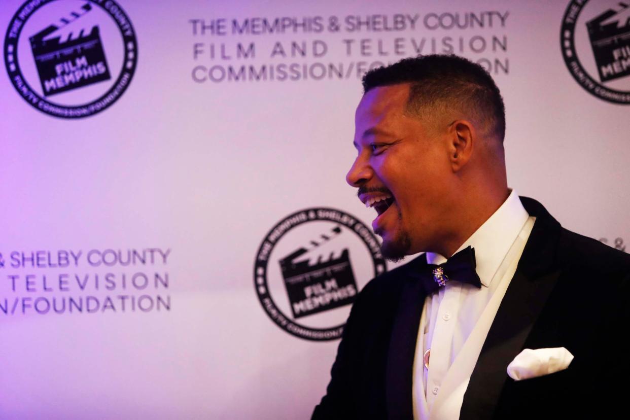 Actor Terrence Howard greets guests on the red carpet during the theatrical premiere of his new movie, "Showdown at the Grand," at Malco Powerhouse cinema on Wednesday, Nov. 8, 2023, in Downtown Memphis.