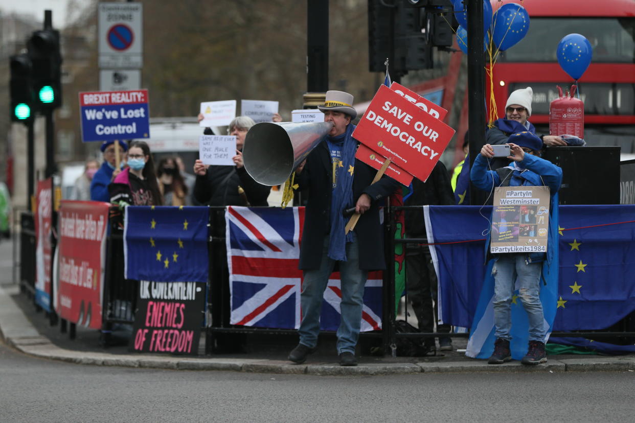 LONDON, UNITED KINGDOM - DECEMBER 15: Brexit opponents stage a demonstration before British Prime Minister Boris Johnson's weekly Prime Minister's Questions (PMQs) appearance in the House of Commons in London, United Kingdom on December 15, 2021. (Photo by Hasan Esen/Anadolu Agency via Getty Images)
