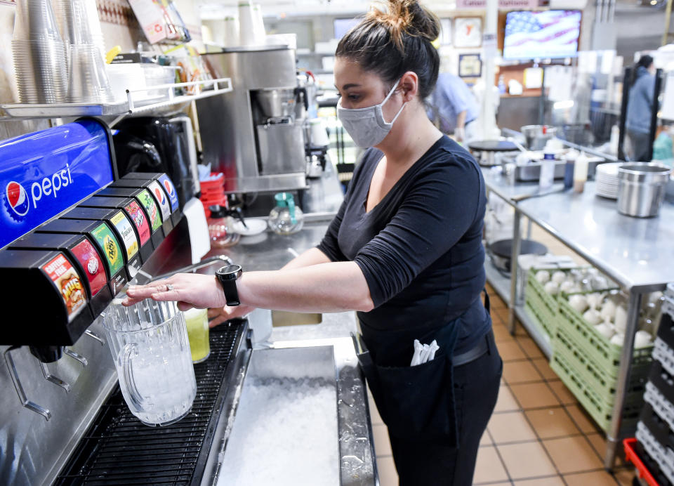 Wyomissing, PA - February 26: Servers Danielle Pyle files a pitcher with water. At the Wyomissing Restaurant and Bakery on Penn Ave in Wyomissing Friday morning February 26, 2021. (Photo by Ben Hasty/MediaNews Group/Reading Eagle via Getty Images)