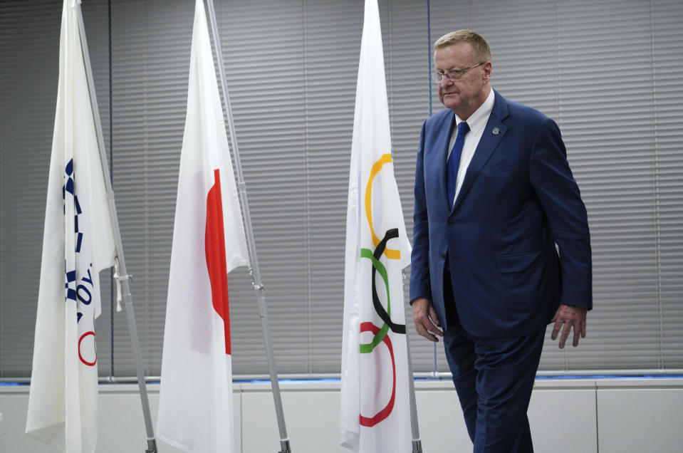 John Coates, chairman of the IOC Coordination Commission for the 2020 Tokyo Olympics and Paralympics leaves from the venue of the IOC and Tokyo 2020 joint press conference Wednesday, Sept. 12, 2018. (AP Photo/Eugene Hoshiko)