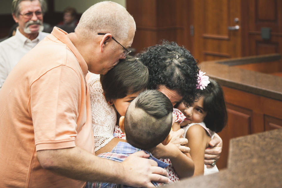 "This is the moment Jim and Jeanette's grandkids officially became their kids. The judge ruled in their favor and everyone in the courthouse cheered with them as they hugged and kissed one another. This was a hard-fought battle, and they were relieved it was finally over." -- Jennifer Hicks