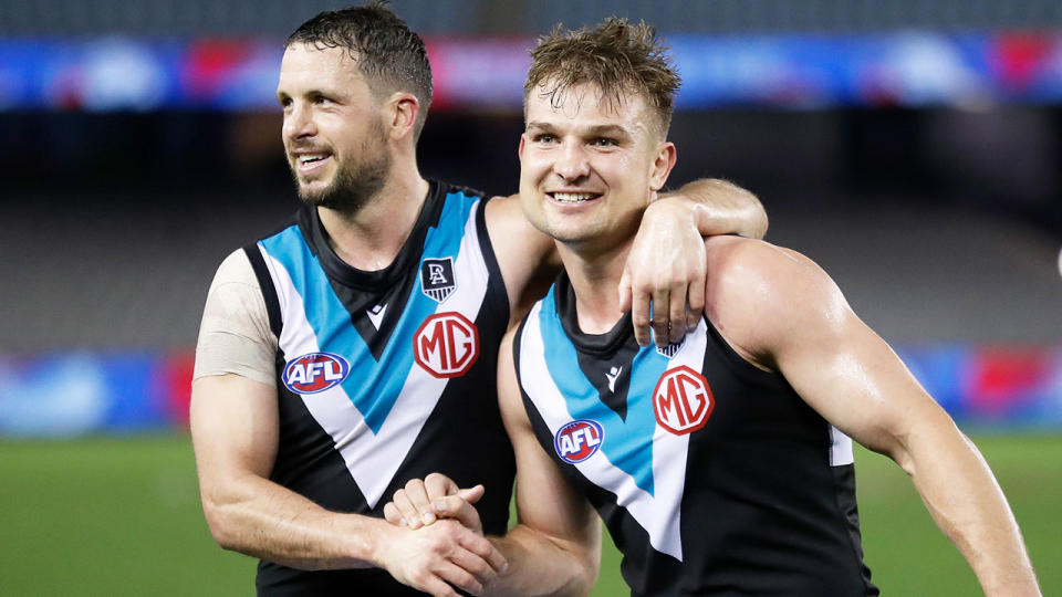 Seen here, Ollie Wines celebrates a goal for Port Adelaide in the AFL finals.