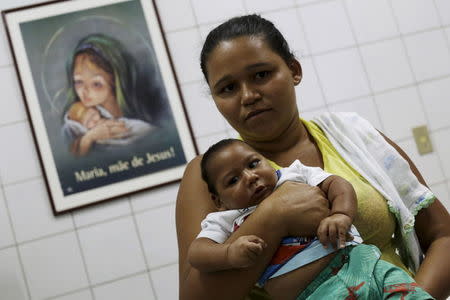 Rain Gomes waits for medical care with her son Alessandro Gomes, who has microcephaly, at the Oswaldo Cruz Hospital in Recife, Brazil, January 26, 2016. REUTERS/Ueslei Marcelino