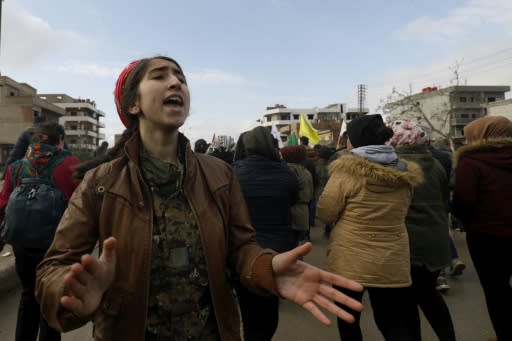 Syrian Kurds demonstrate in the northeastern city of Qamishli on December 28, 2018, against Turkish threats of a new cross-border offensive following the US decision to withdraw their troops