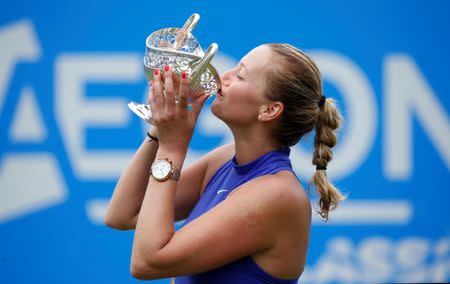 Tennis - WTA Premier - Aegon Classic - Edgbaston Priory Club, Birmingham, Britain - June 25, 2017 Czech Republic's Petra Kvitova kisses the trophy after winning the final against Australia's Ashleigh Barty Action Images via Reuters/Peter Cziborra