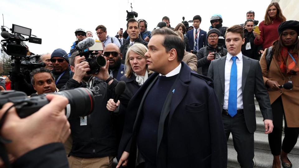 PHOTO: Rep. George Santos is surrounded by journalists as he leaves the U.S. Capitol after his fellow members of Congress voted to expel him from the House of Representatives on Dec. 1, 2023 in Washington, DC.  (Kevin Dietsch/Getty Images)