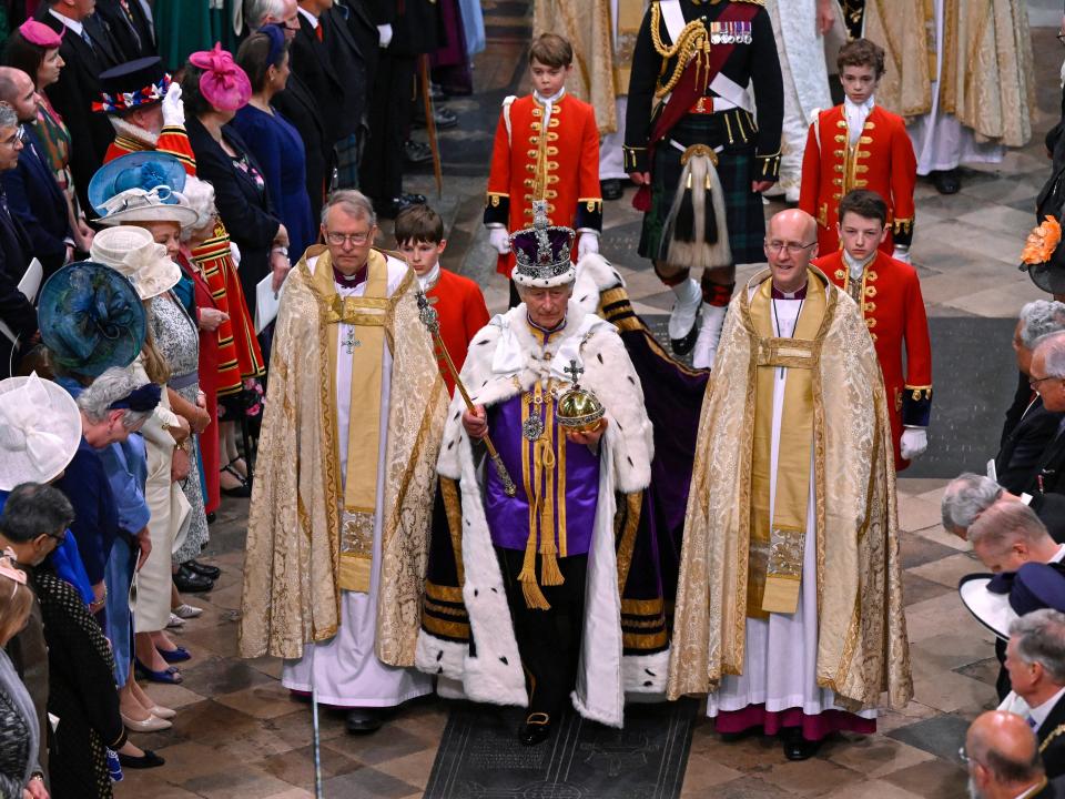 King Charles III departs the Coronation service at Westminster Abbey on May 6, 2023 in London, England.