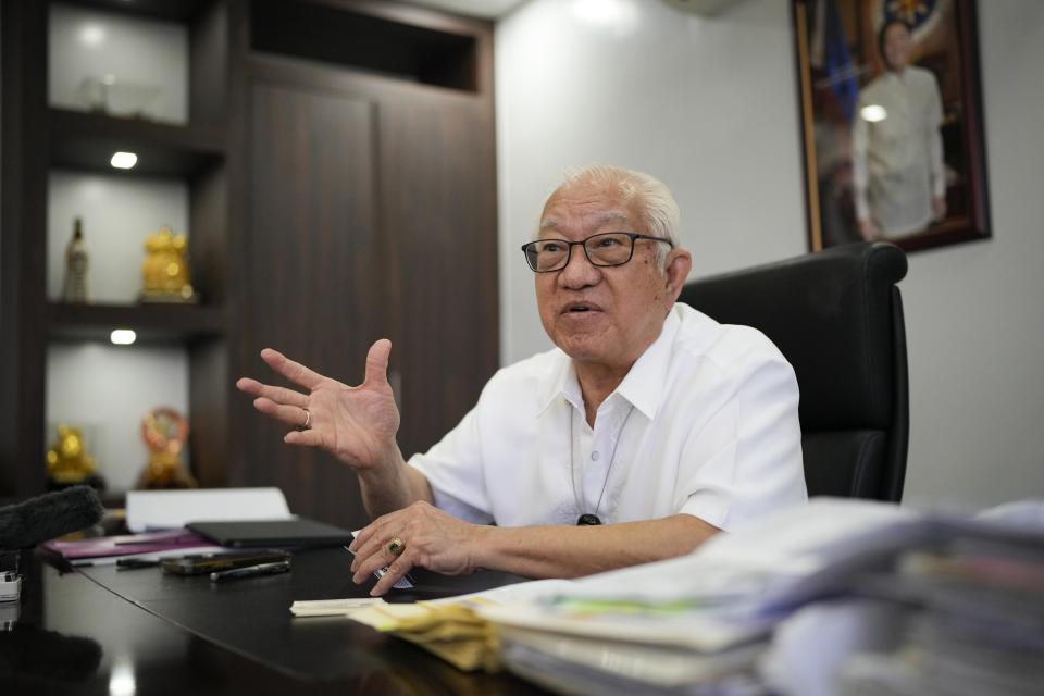 Batangas Gov. Hermilando Mandanas gestures during an interview with The Associated Press at his office in the city of Batangas, Batangas province, Philippines on Thursday, Aug. 10, 2023. Mandanas and his late wife stood to profit from a buildout of liquefied natural gas power because he owned the largest share in a real estate firm that soared in value as energy companies moved in. (AP Photo/Aaron Favila)