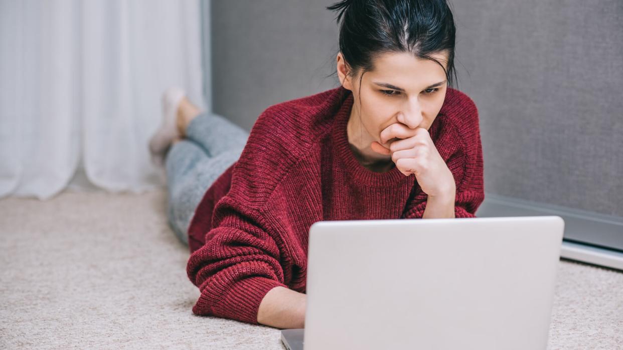 young woman doing research work for her business.