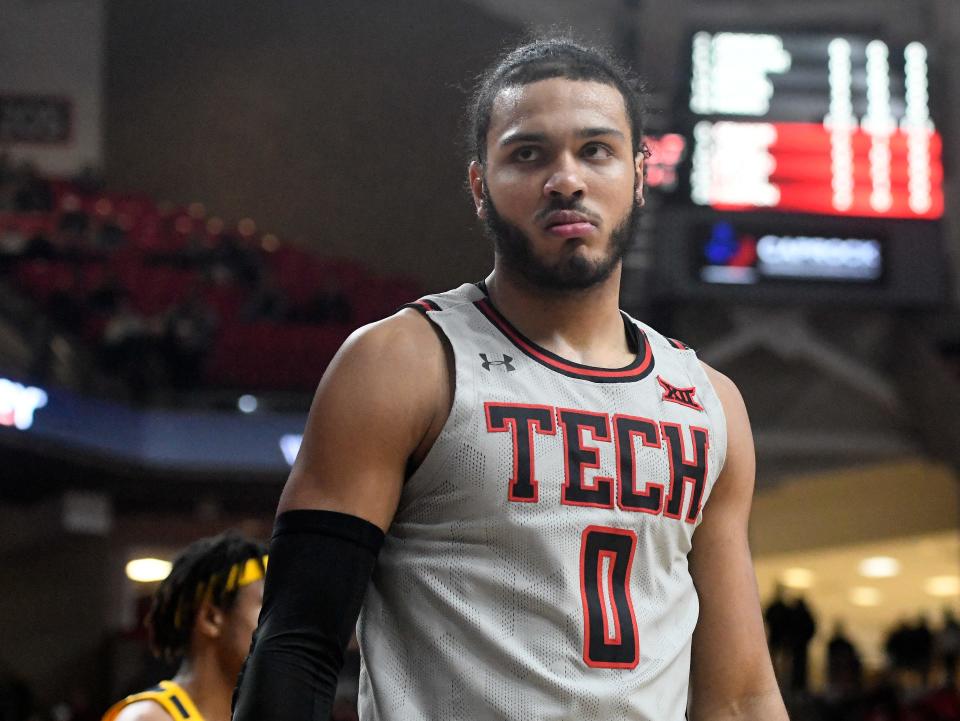 Texas Tech's forward Kevin Obanor (0) makes a face after dunking against West Virginia in a Big 12 basketball game, Wednesday, Jan. 25, 2023, at United Supermarkets Arena. 