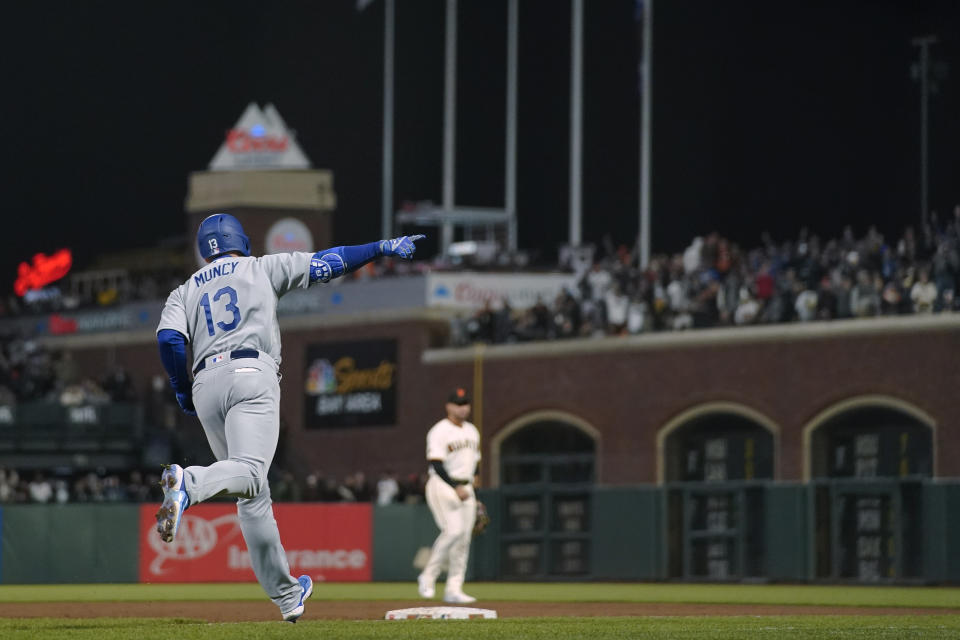 Los Angeles Dodgers' Max Muncy runs the bases after hitting a three-run home run against the San Francisco Giants during the sixth inning of a baseball game in San Francisco, Wednesday, April 12, 2023. (AP Photo/Godofredo A. Vásquez)