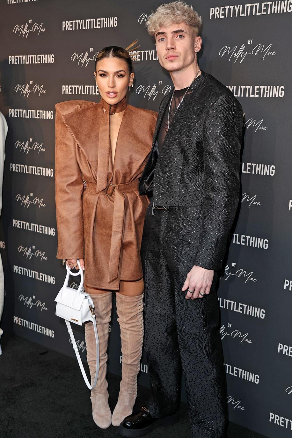 LONDON, ENGLAND - FEBRUARY 16: Emily Miller and Cam Holmes attend the PrettyLittleThing X Molly-Mae show at The Londoner Hotel on February 16, 2022 in London, England. (Photo by Mike Marsland/WireImage)