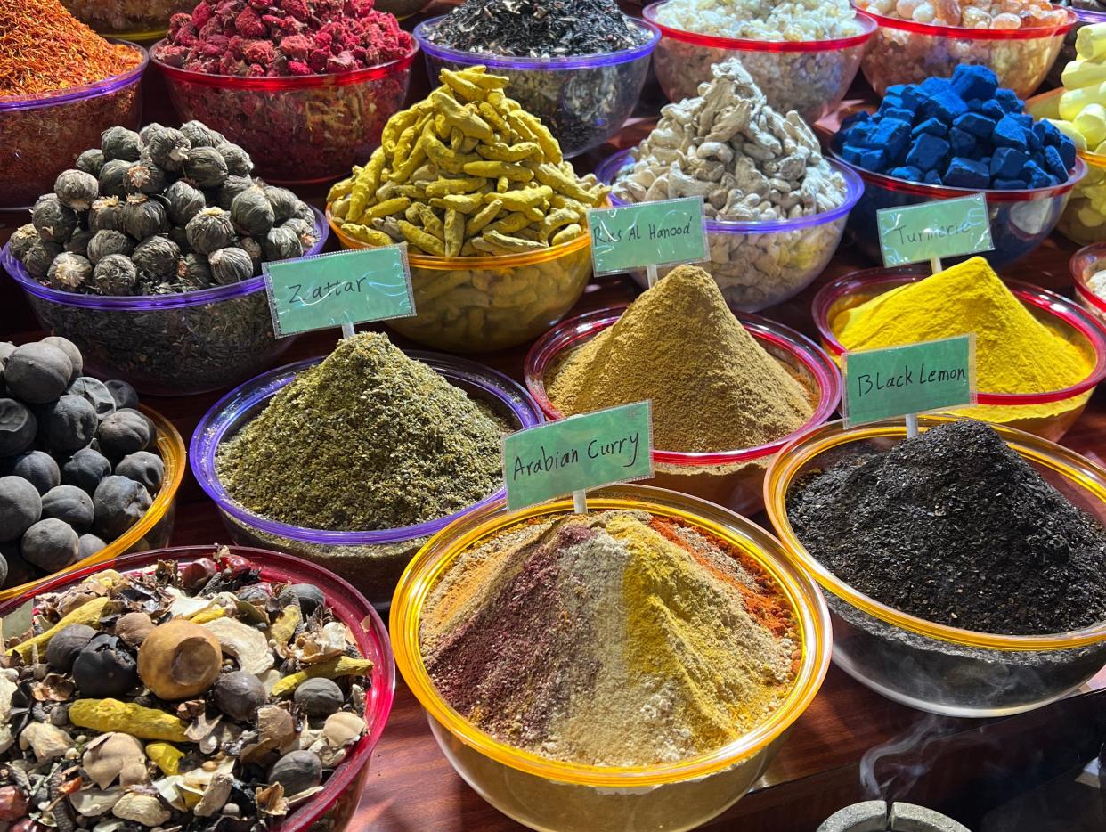 Bowls of spices in ever color of the rainbow at a market in Dubai