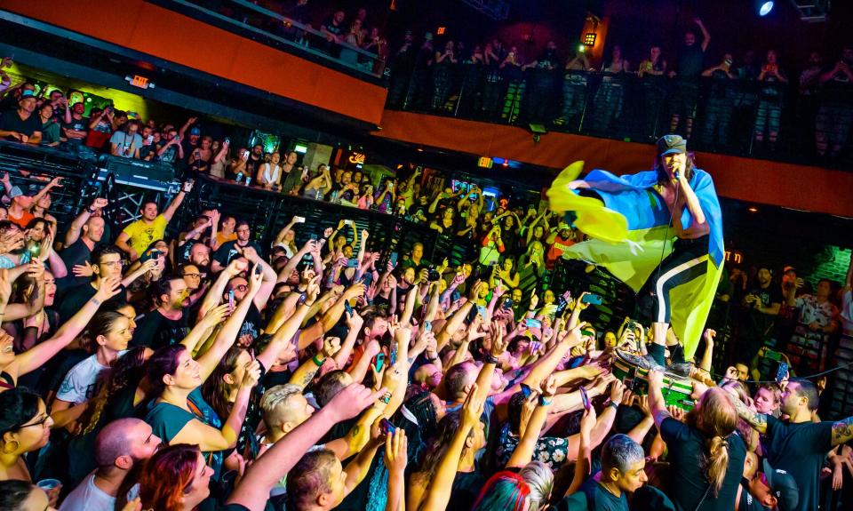 Former Burlington resident Eugene Hutz leads his band Gogol Bordello in a scene from the 2023 documentary "Scream of My Blood: A Gogol Bordello Story."