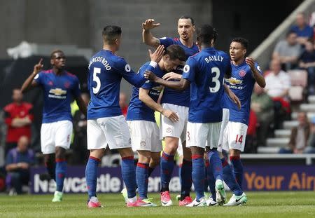 Britain Football Soccer - Sunderland v Manchester United - Premier League - Stadium of Light - 9/4/17 Manchester United's Zlatan Ibrahimovic celebrates scoring their first goal with teammates Reuters / Russell Cheyne Livepic