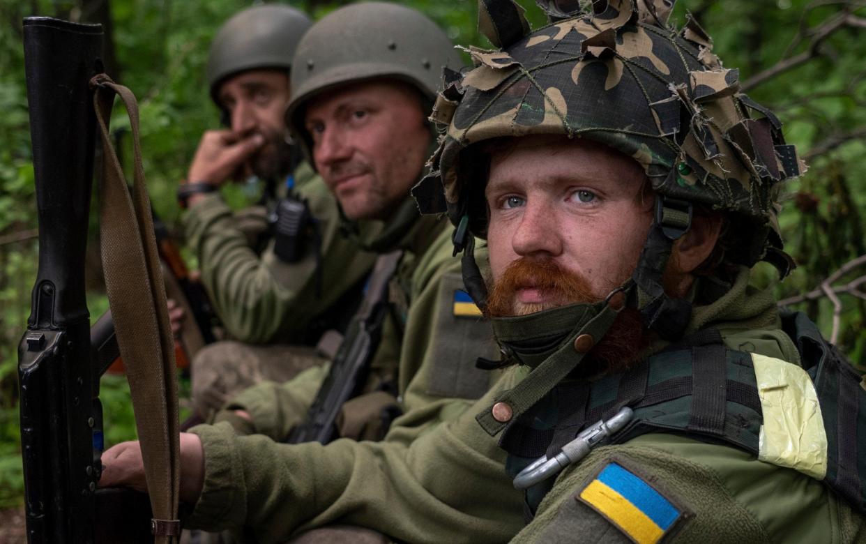 Ukrainian servicemen - Mstyslav Chernov/AP Photo 