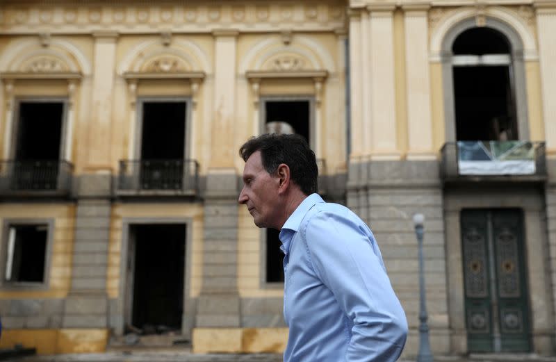 FILE PHOTO: Rio de Janeiro's Mayor Marcelo Crivella walks outside the National Museum of Brazil in Rio de Janeiro