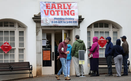 Early voters arrive at a polling station in Athens, Georgia, U.S., October 26, 2018 ahead of the midterm elections. REUTERS/Lawrence Bryant/File Photo