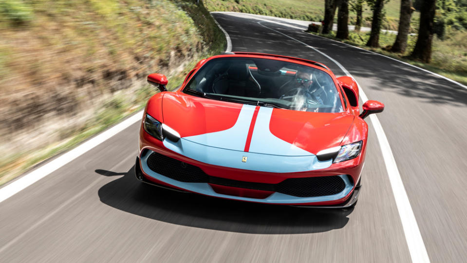 Driving the Ferrari 296 GTS hybrid convertible supercar.