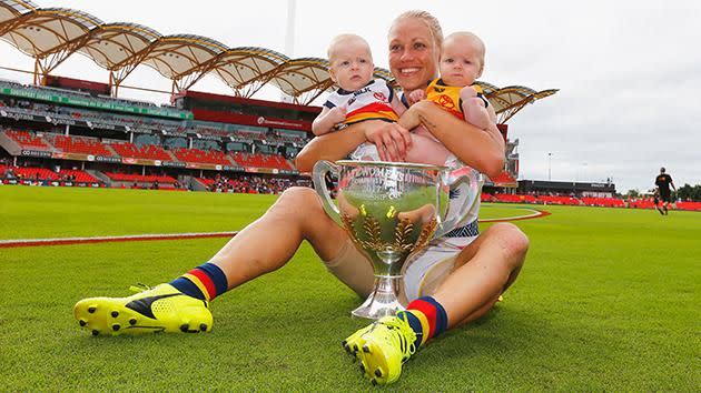 Erin Phillips celebrates the premiership with her two children. Pic: Getty