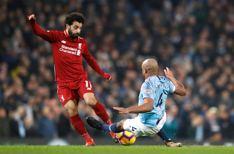 Vincent Kompany is only yellow carded after a lunge at Mo Salah. Manchester City win the game and the title. (3 January 2019)