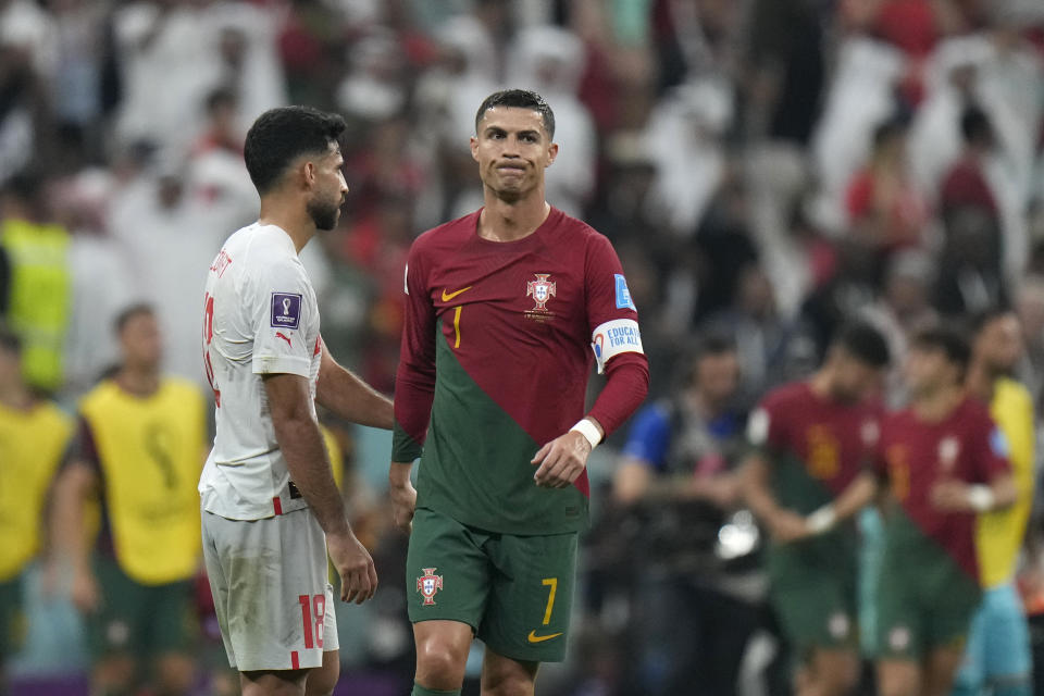 Portugal's Cristiano Ronaldo walks during the World Cup round of 16 soccer match between Portugal and Switzerland, at the Lusail Stadium in Lusail, Qatar, Tuesday, Dec. 6, 2022. (AP Photo/Alessandra Tarantino)