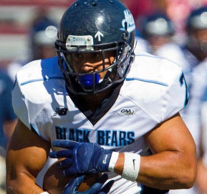 University of Maine linebacker Cabrinni Goncalves returns an interception during a collegiate game