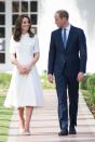 <p>Kate wears a white button up A-line dress by <a href="http://www.emiliawickstead.com/" rel="nofollow noopener" target="_blank" data-ylk="slk:Emilia Wickstead;elm:context_link;itc:0;sec:content-canvas" class="link ">Emilia Wickstead</a> during a visit to the Mahatma Gandhi museum in New Delhi. </p>