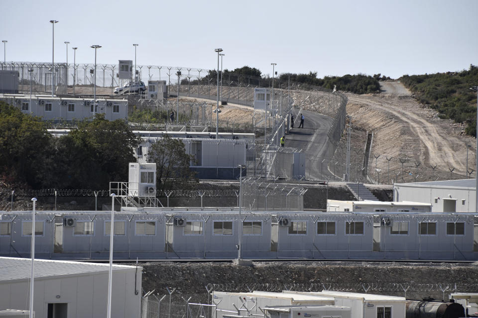 A view of the new multi-purpose reception and identification migrant centre which was constructed near Vathy town, on the eastern Aegean island of Samos, Greece, Saturday, Sept. 18, 2021. The centre constructed following a 121 million euros agreement between the European Commission and the Greek Ministry of Migration and Asylum, an amount granted to Greece for the construction of 3 reception centres on the islands of Samos, Kos, and Leros. (AP Photo/Michael Svarnias)