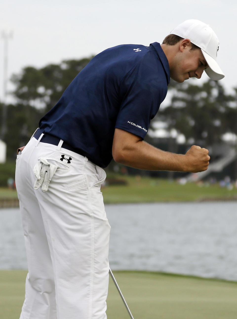 Jordan Spieth gestures after he made a birdie on the 18th hole during the third round of The Players championship golf tournament at TPC Sawgrass, Saturday, May 10, 2014, in Ponte Vedra Beach, Fla. (AP Photo/Lynne Sladky)