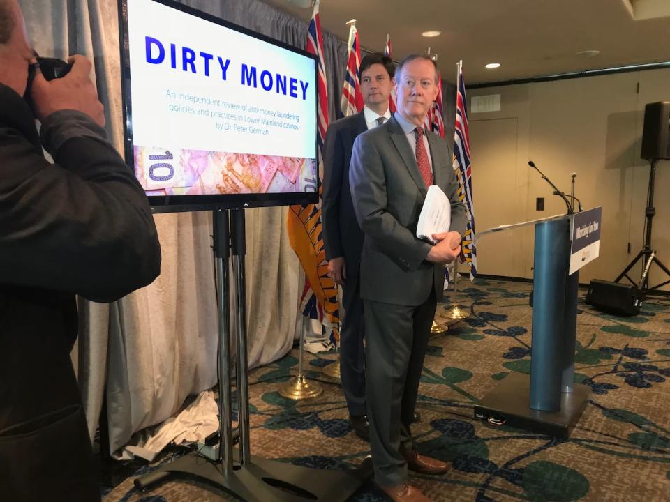 B.C. Attorney General David Eby and investigator Peter German at the release of German's report, Dirty Money, in Vancouver, June 27, 2018. 