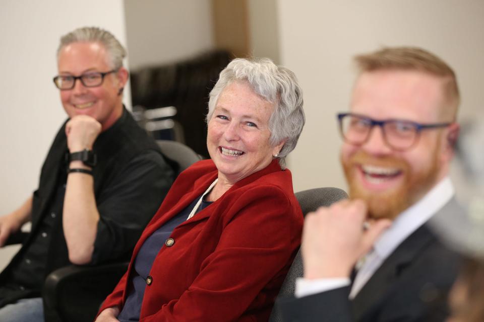 Valerie Rochon, center, the Portsmouth 400th anniversary celebration's managing director, is joined by fellow organizers Trevor Bartlett, left, and Monte Bohanan, right, for a discussion about the city's quadricentennial parade to be held Saturday, June 3, 2023.