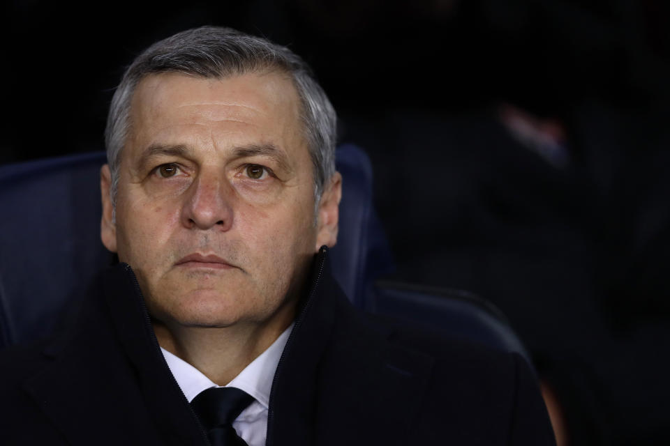 FILE - In this March 13, 2019 file photo, Lyon coach Bruno Genesio stands on the touchline before the Champions League round of 16, 2nd leg, soccer match between FC Barcelona and Olympique Lyon at the Camp Nou stadium in Barcelona, Spain. Despite a season marred by many ups and downs and the hostility of many fans, the Lyon coach Bruno Genesio had reportedly reached a deal with president Jean-Michel Aulas for a two-year contract extension. (AP Photo/Manu Fernandez, File)