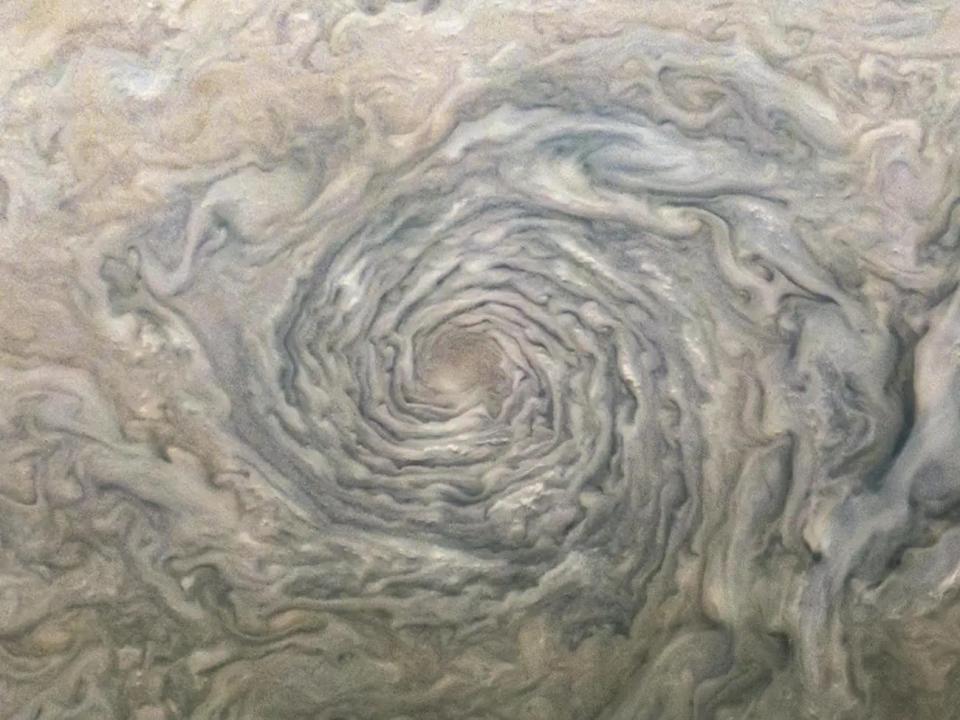 Cyclonic storm on the surface of Jupiter.