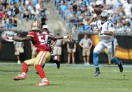 <p>Carolina Panthers’ Cam Newton (1) looks to pass over San Francisco 49ers’ Ray-Ray Armstrong (54) in the first quarter of an NFL football game in Charlotte, N.C., Sunday, Sept. 18, 2016. (AP Photo/Mike McCarn) </p>