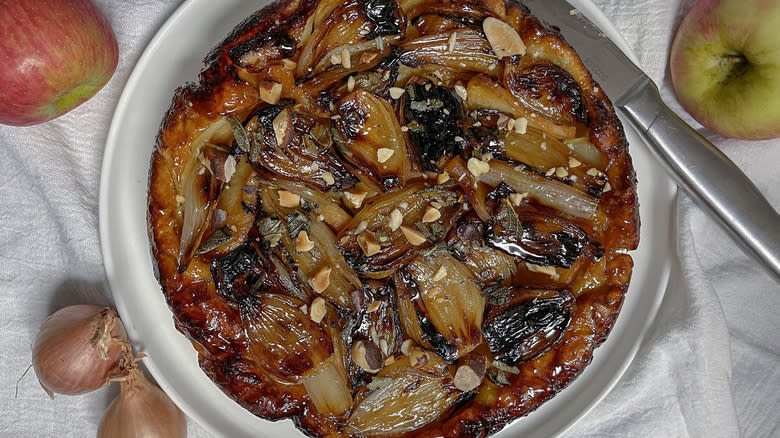 caramelized shallot tarte with brazil nuts and sage