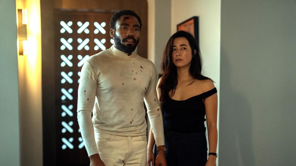 PHOTO: Donald Glover and Maya Erskine appear in a scene from the movie, 'Mr. & Mrs. Smith.' (David Lee/Prime Video)