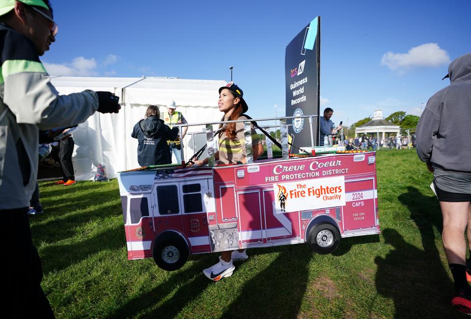 A competitor dressed as a fire engine (Zac Goodwin/PA Wire)