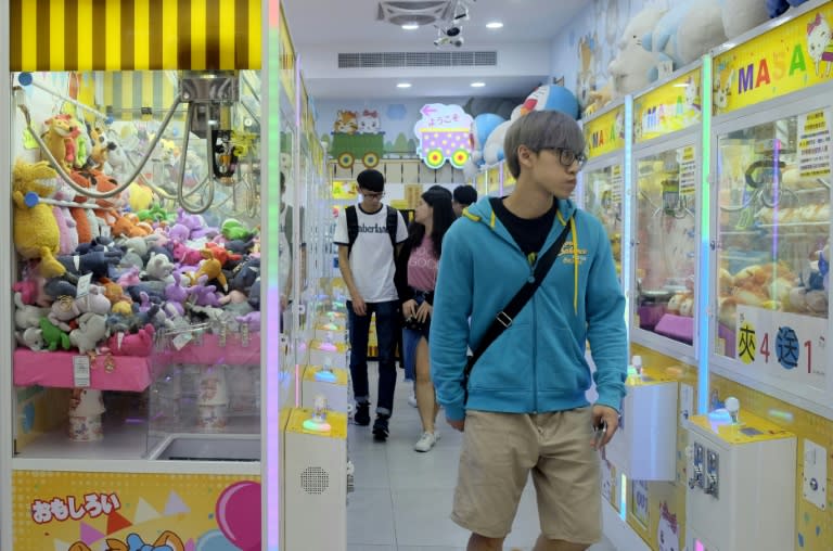 Some claw machines stand in neighbourhood grocery stores, while others sit in brightly lit arcades