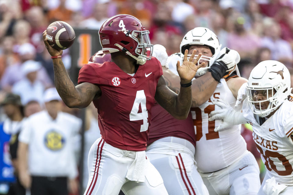 Alabama quarterback Jalen Milroe (4) throws against Texas during the first half of an NCAA college football game, Saturday, Sept. 9, 2023, in Tuscaloosa, Ala. (AP Photo/Vasha Hunt)