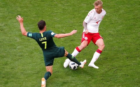 Soccer Football - World Cup - Group C - Denmark vs Australia - Samara Arena, Samara, Russia - June 21, 2018 Denmark's Simon Kjaer in action with Australia's Mathew Leckie - Credit: REUTERS