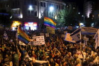 People take part in a rally to condemn an attack on the annual Gay Pride parade in Jerusalem August 1, 2015. REUTERS/Ronen Zvulun