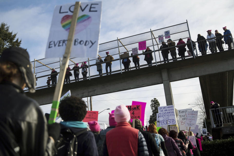 FILE - In this Saturday, Feb. 11, 2017, file photo, demonstrators gather to counter an anti-Planned Parenthood rally in Kent, Wash. Even with the Republican failure to repeal Barack Obama's health care law, Democratic lawmakers in some states are pressing ahead with efforts to protect birth control access, Planned Parenthood funding and abortion coverage in case they are jeopardized in the future. (Grant Hindsley/seattlepi.com via AP, File)