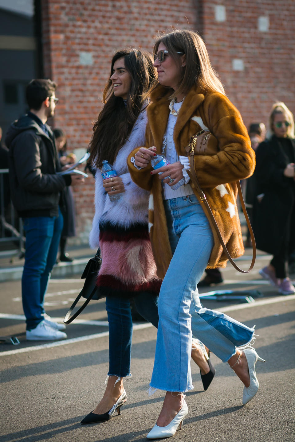 Chiara Totire and Aurora Sansone rock similar ladylike heels and hacked-hem denim.