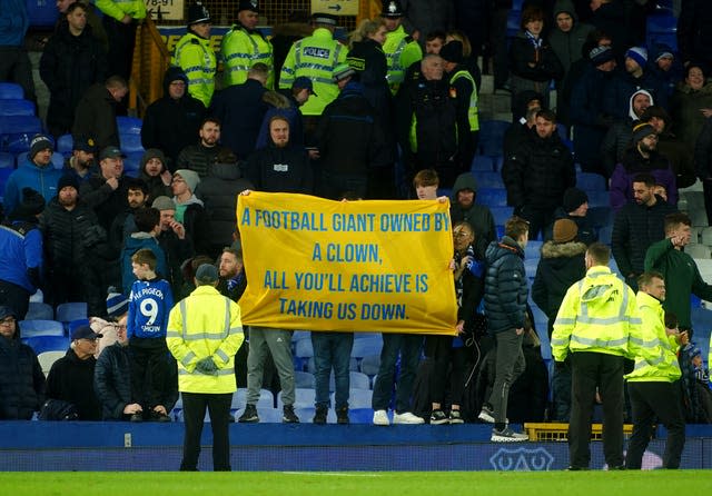 Everton fans hold up banners in protest against the club hierarchy after the 2-1 defeat to Southampton at Goodison Park (Peter Byrne/PA).