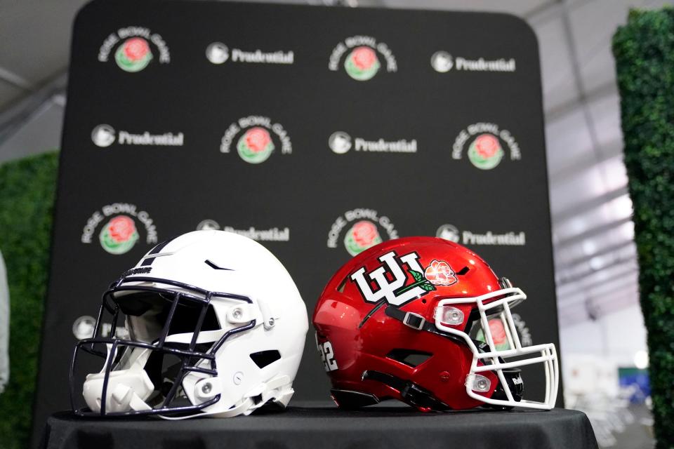 The Utah and Penn State helmets are placed together during media day ahead of the Rose Bowl NCAA college football game Saturday, Dec. 31, 2022, in Pasadena, Calif. (AP Photo/Marcio Jose Sanchez)