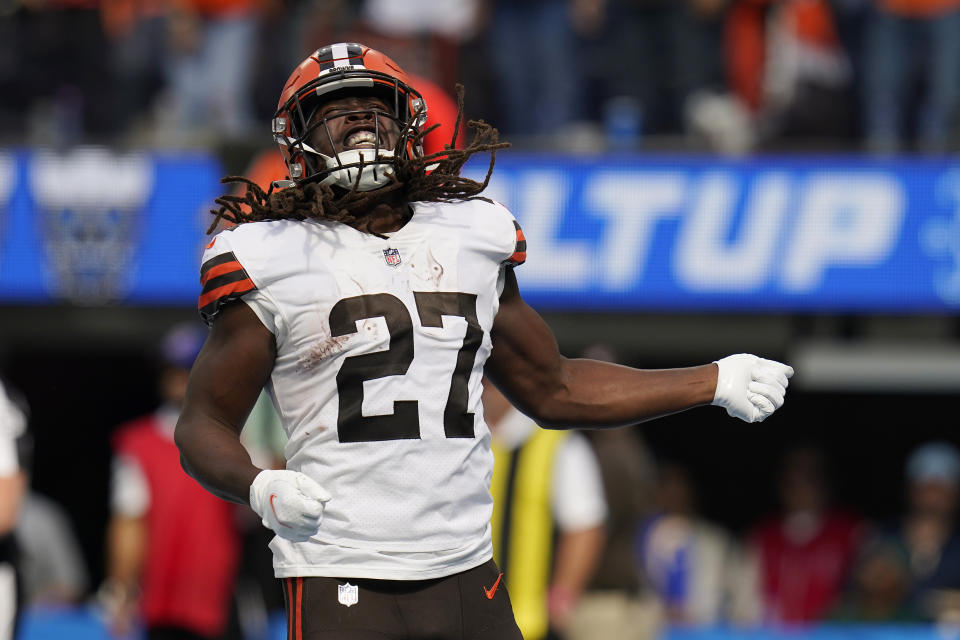 Cleveland Browns running back Kareem Hunt (27) celebrates his rushing touchdown during the first half of an NFL football game against the Los Angeles Chargers Sunday, Oct. 10, 2021, in Inglewood, Calif. (AP Photo/Gregory Bull)
