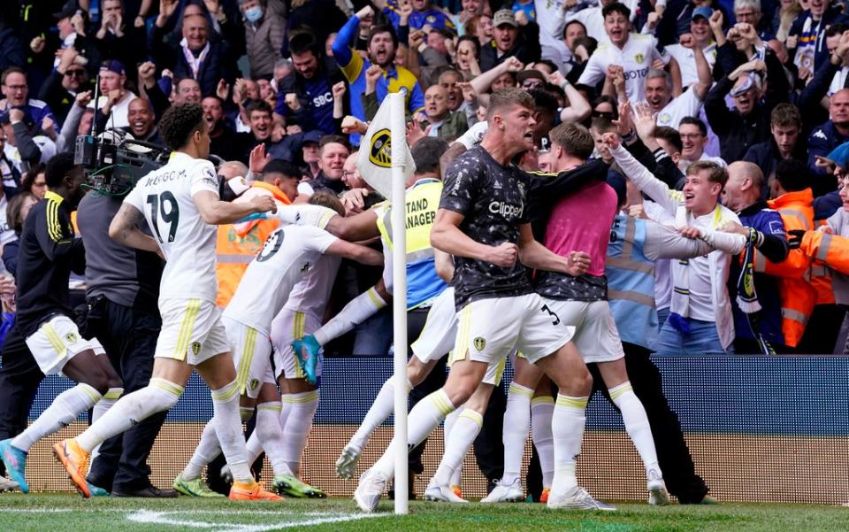 Leeds United celebrate with fans after Pascal Struijk scores (PA)